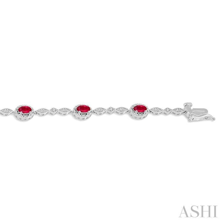 5x3 MM Oval Cut Ruby and 1/20 Ctw Single Cut Diamond Bracelet in 10K White Gold