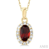 5x3 MM Oval Shape Garnet and 1/20 Ctw Single Cut Diamond Halo Semi-Precious Pendant with Chain in 10K Yellow Gold