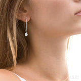 1/2 Ctw Pear Shape Dangler Lovebright Round Cut Diamond Earrings in 14K White Gold