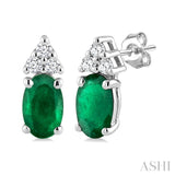 1/20 Ctw Oval Cut 5X3 MM Emerald and Round Cut Diamond Precious Earrings in 10K White Gold
