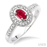 5x3 MM Oval Cut Ruby and 1/10 Ctw Single Cut Diamond Ring in 10K White Gold.