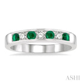 1/5 Ctw Channel Set Round Cut Diamond and 2.5 MM Round Cut Emerald Band in 14K White Gold