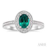 7X5 MM Oval Shape Lab-Created Emerald and 1/50 Ctw Round Cut Diamond Precious Ring in Sterling Silver