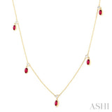 1/8 ctw Round Cut Diamonds and 5X3MM Oval Shape Ruby Precious Station Necklace in 10K Yellow Gold