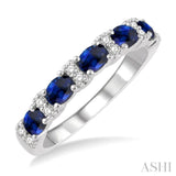 1/6 Ctw Oval Shape 4x3 MM Sapphire and Round Cut Diamond Precious Band in 14K White Gold