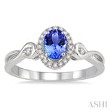 6x4 MM Oval Cut Tanzanite and 1/10 Ctw Round Cut Diamond Ring in 14K White Gold