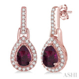 6x4 MM Pear Shape Rhodolite Garnet and 1/5 Ctw Round Cut Diamond Earrings in 10K Rose Gold