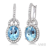 9x7mm Oval Cut Aquamarine and 3/8 Ctw Round Cut Diamond Earrings in 14K White Gold