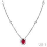 6X4MM Oval Cut Ruby and 1/6 Ctw Round Cut Diamond Necklace in 14K White Gold
